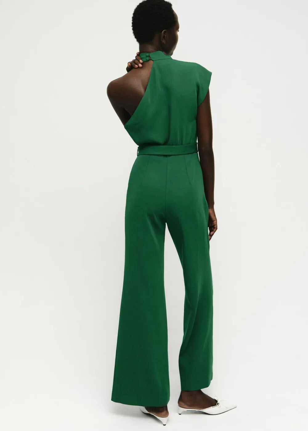 Asymmetrical long jumpsuit with bel>MANGO Online