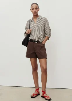 Dame MANGO Denim shorts with frayed hem and pl