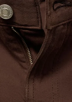 Dame MANGO Denim shorts with frayed hem and pl