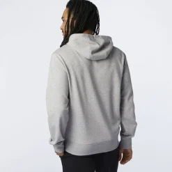 Essentials Stacked Logo Haettetroje><noscript><img width=